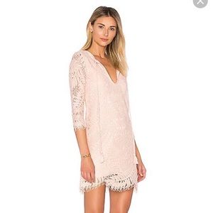 Beautiful dress by Lovers & Friends. Never worn with tag. All seasons.